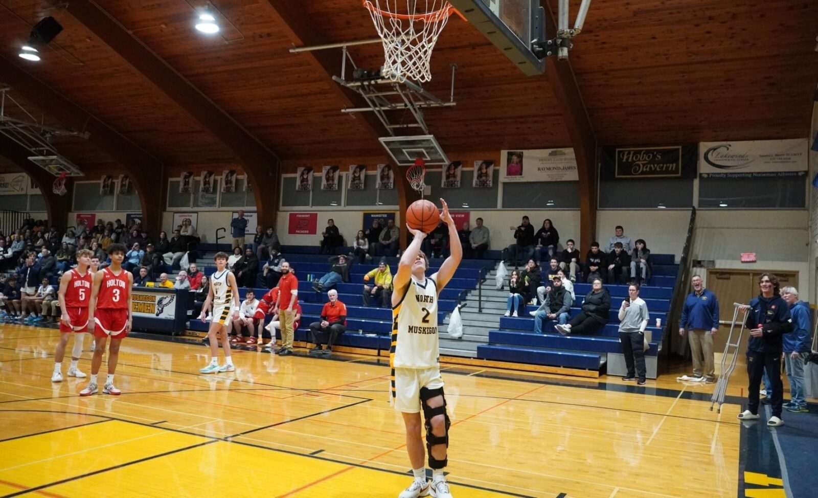 Bittersweet home finale for injured North Muskegon basketball player ...